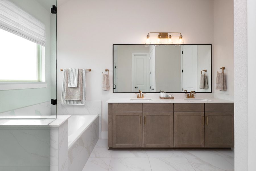 Furnished interior in a model home at Willow Springs in Buda (Image 8).