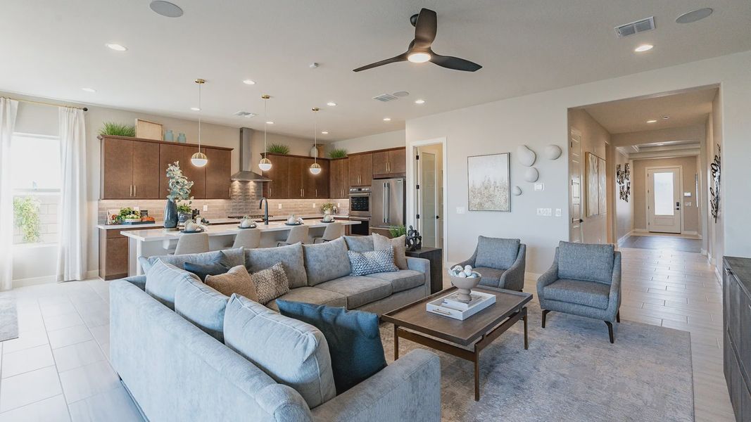 Luxurious interiors feature elegant pendant lighting and rich wood cabinetry in Arroyo Seco. Luxurious interiors feature elegant pendant lighting and rich wood cabinetry in Arroyo Seco.