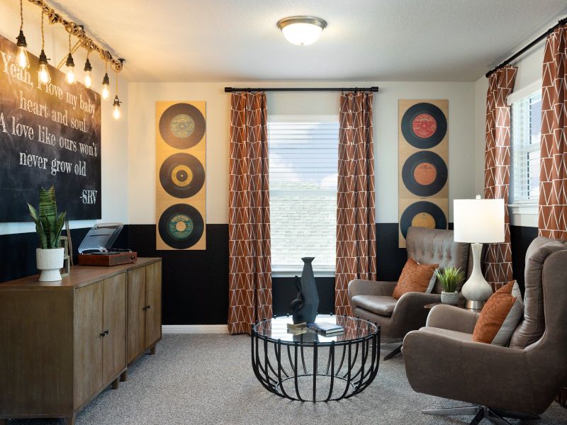 Furnished interior in a model home at Waterstone Crossing in Kyle (Image 35).