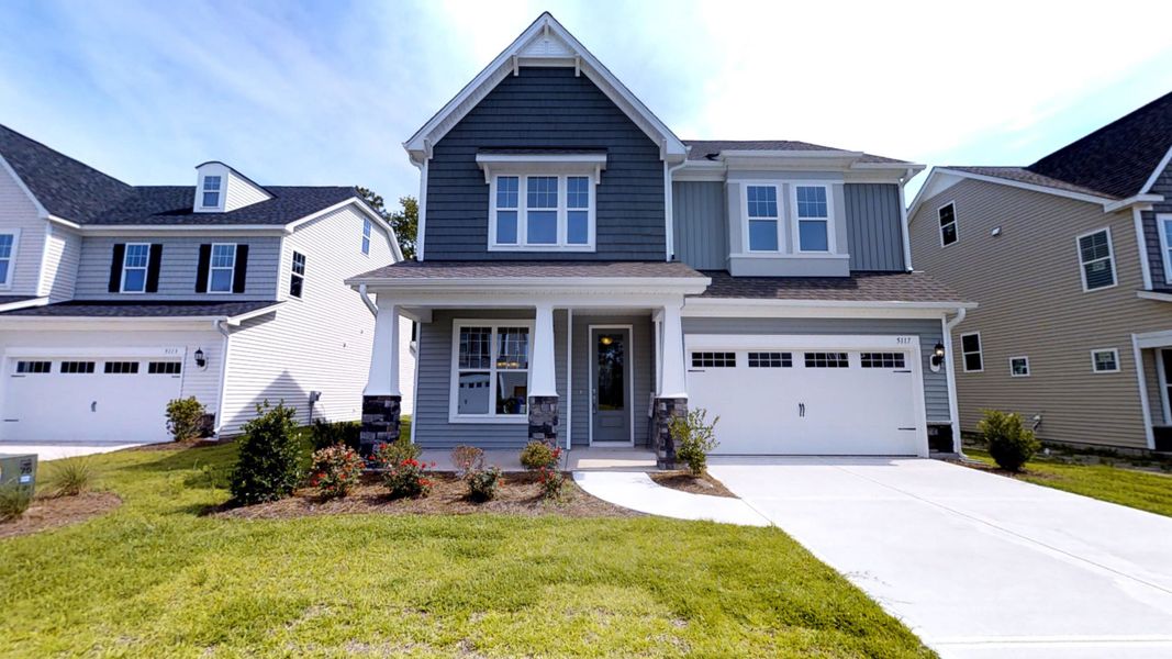 Front exterior of a home in the Laurenbridge - Robuck Homes community, located in Garner, NC (Image 4). Front exterior of a home in the Laurenbridge - Robuck Homes community, located in Garner, NC (Image 4).
