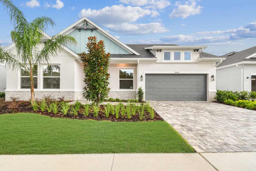 Front exterior of a home in the Lakeview Crossing – Classic Series community, located in Sarasota, FL (Image 4).