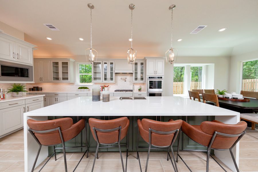 Furnished interior in a model home at COLTON in Todd Mission (Image 4).