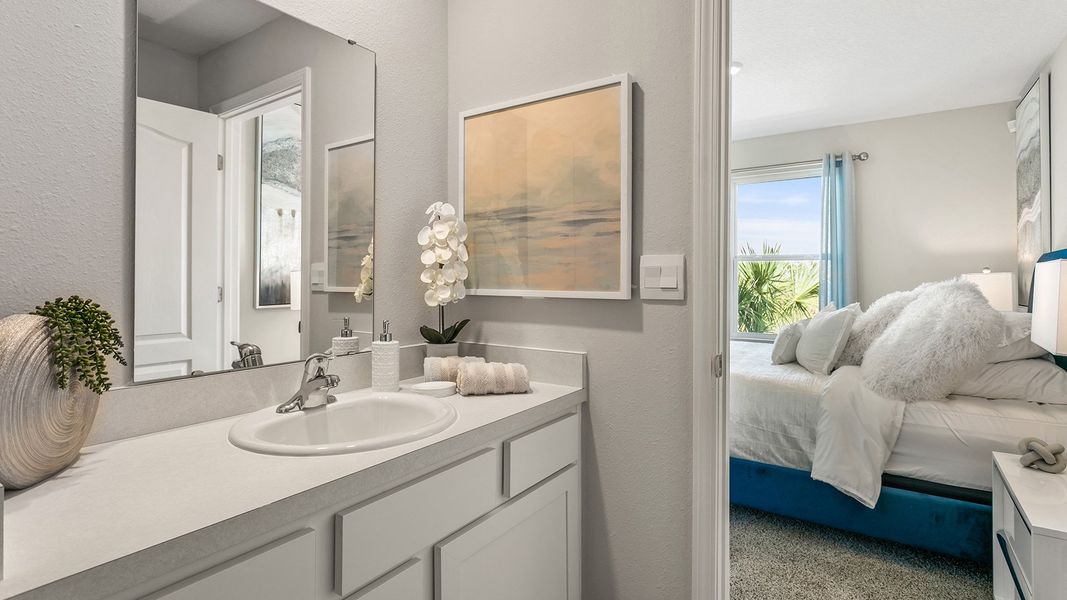 Furnished interior in a model home at Stokes Landing Express in St. Augustine (Image 20).