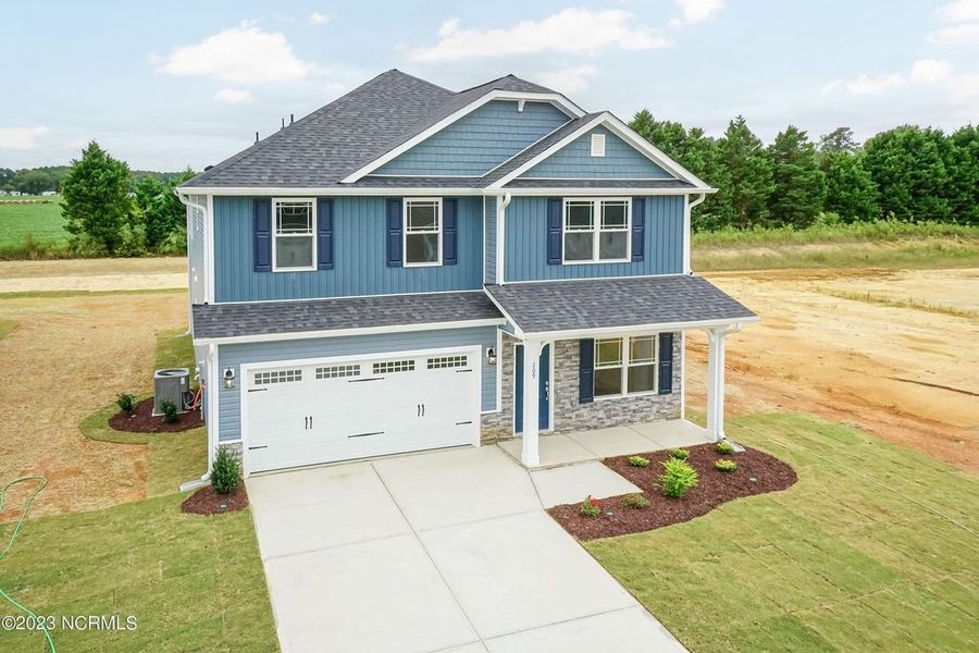 Front exterior of a home in the Waverly Place community, located in Richlands, NC (Image 3).