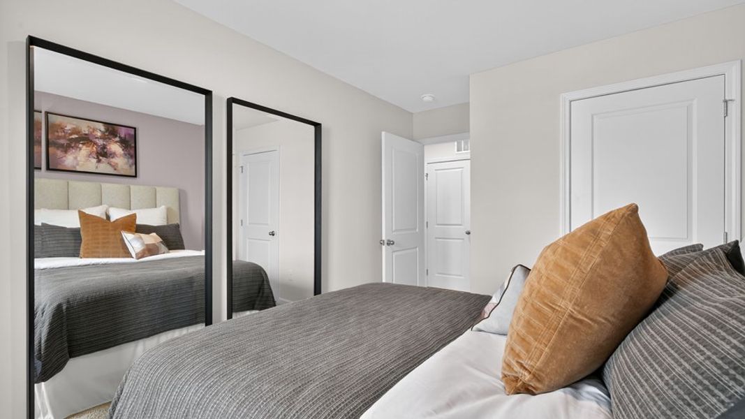 Furnished interior in a model home at The Townes at Belle Grove in Wendell (Image 37).