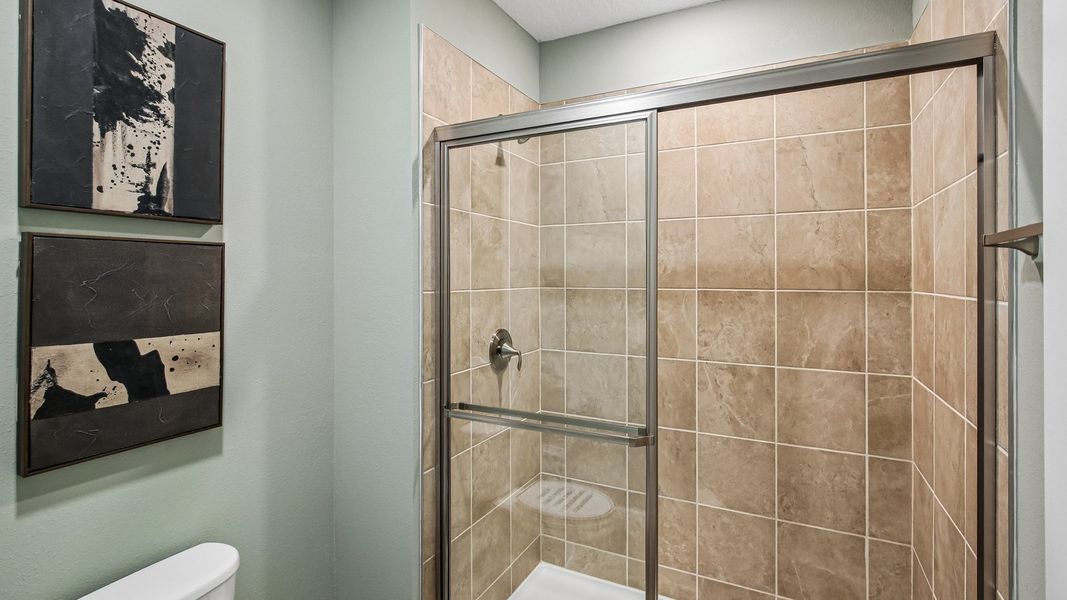 Furnished interior in a model home at Sanctuary at Citrus Park Townhomes in Tampa (Image 19).