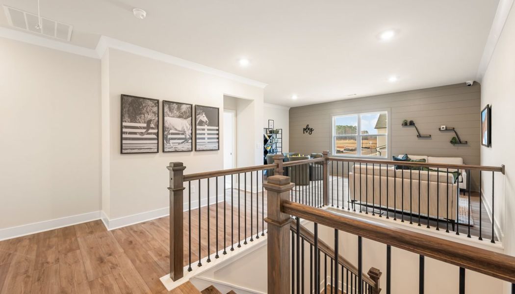 Furnished interior in a model home at Pinecrest Ridge in Dacula (Image 42).