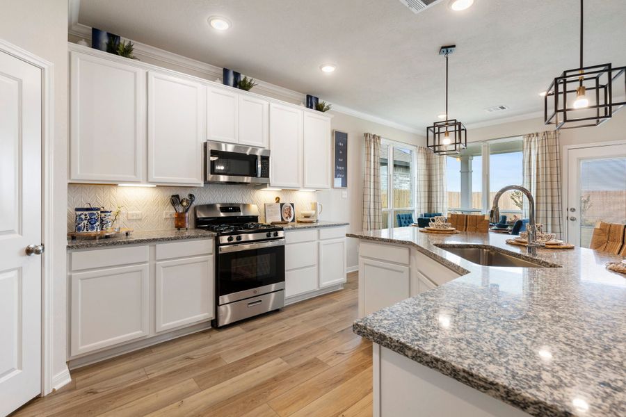 Furnished interior in a model home at Southern Pointe in College Station (Image 9).