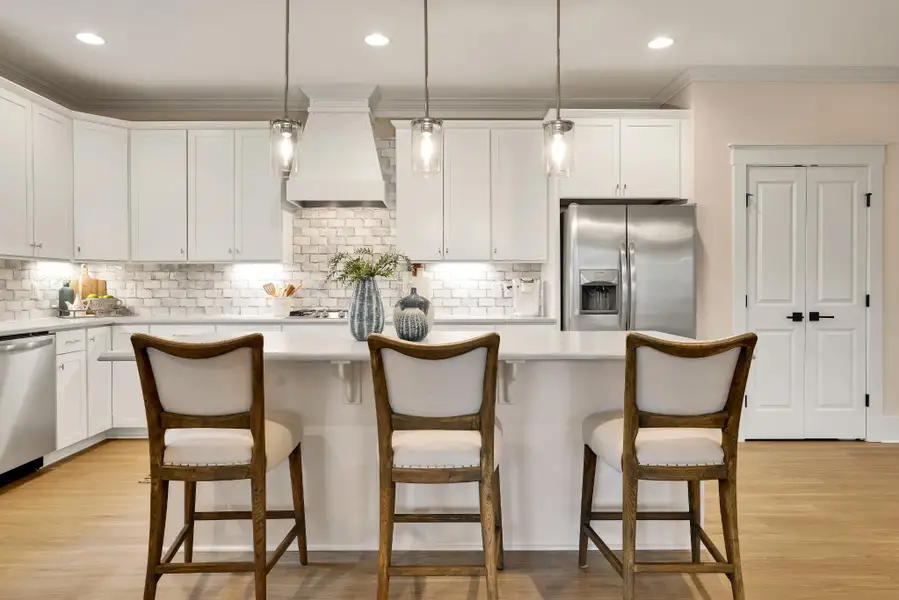 Furnished interior in a model home at Carolina Creek in Hampstead (Image 3).