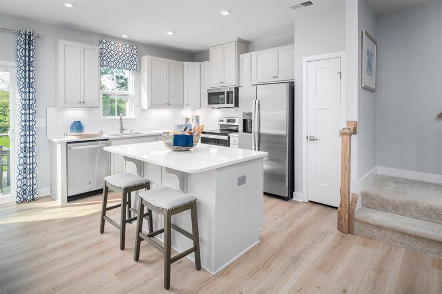 Furnished interior in a model home at Bethel Townes in Mauldin (Image 6).