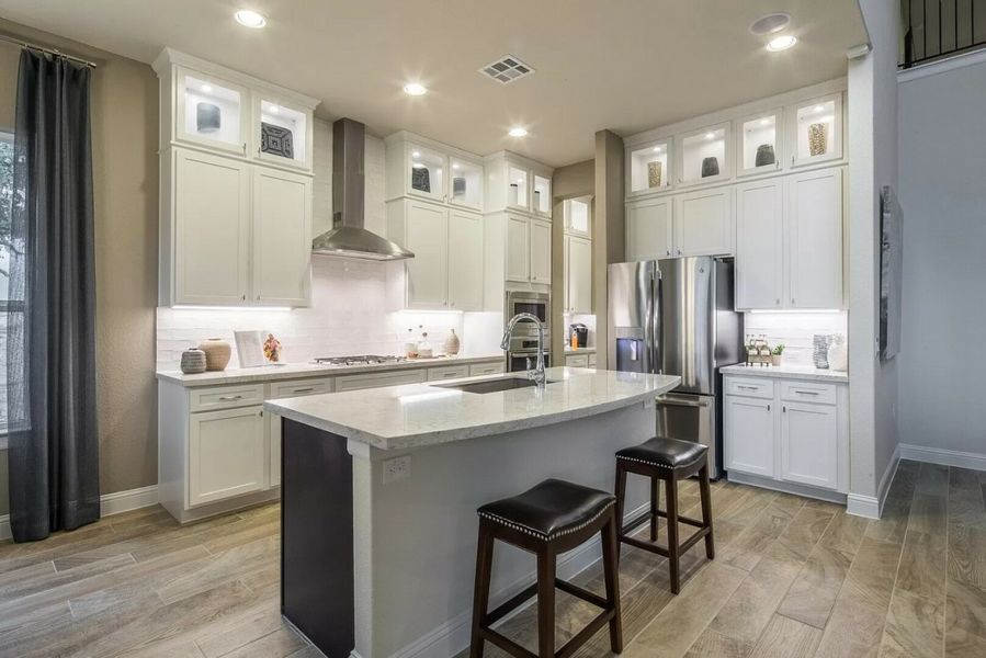 Furnished interior in a model home at Double Eagle Ranch in Cedar Creek (Image 15).