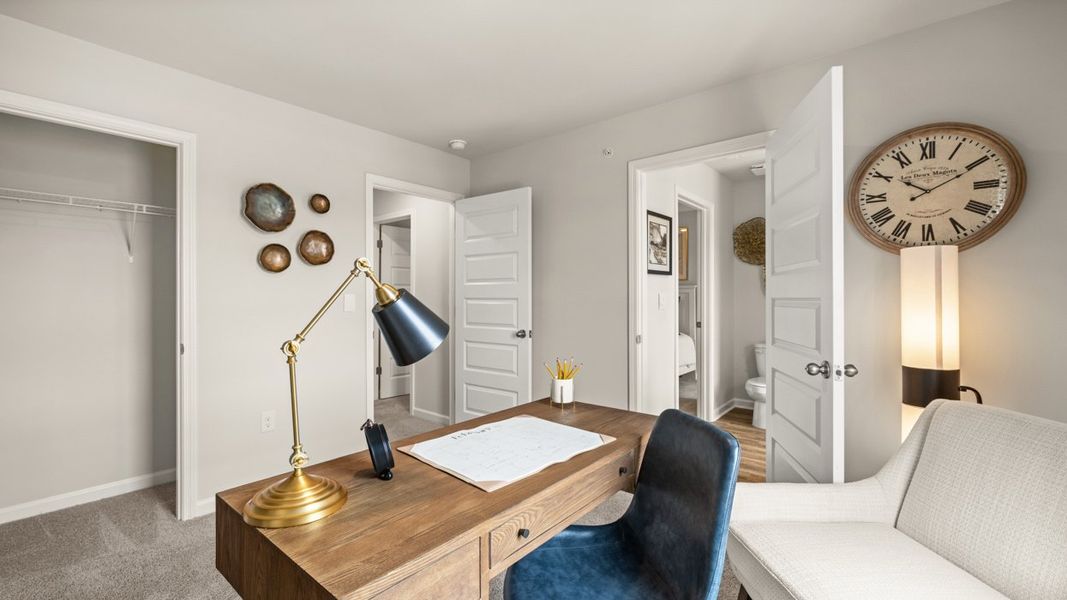 Furnished interior in a model home at The Reserve at North Bridges in McDonough (Image 20).