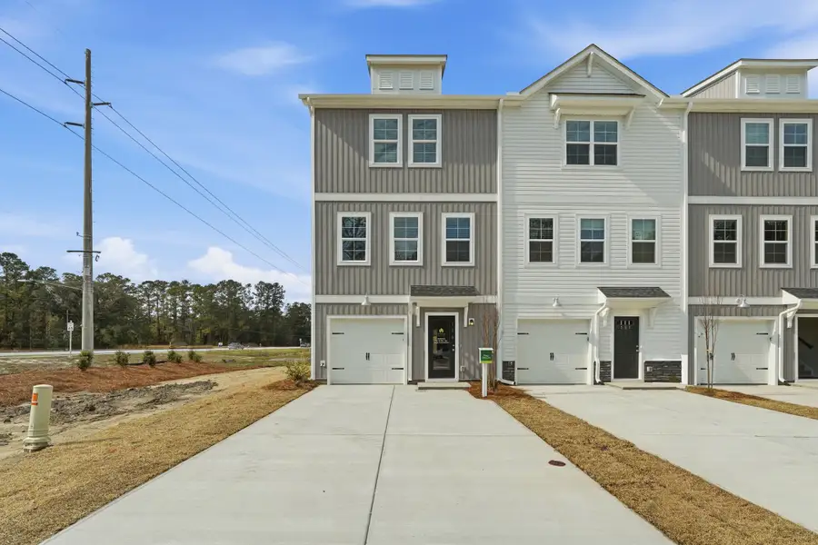 Front exterior of a home in the Liberty Village community, located in Hinesville, GA (Image 9).