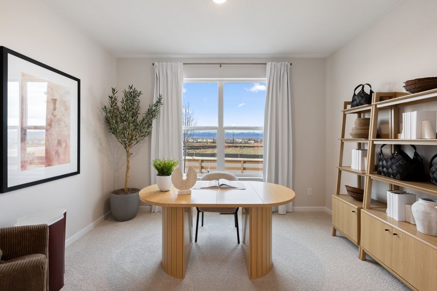 Furnished interior in a model home at Cordovan in Firestone (Image 9).