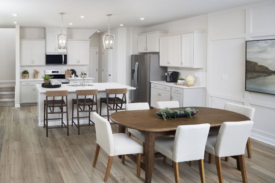 Furnished interior in a model home at Townes at Milhaven in Charlotte (Image 1). Furnished interior in a model home at Townes at Milhaven in Charlotte (Image 1).