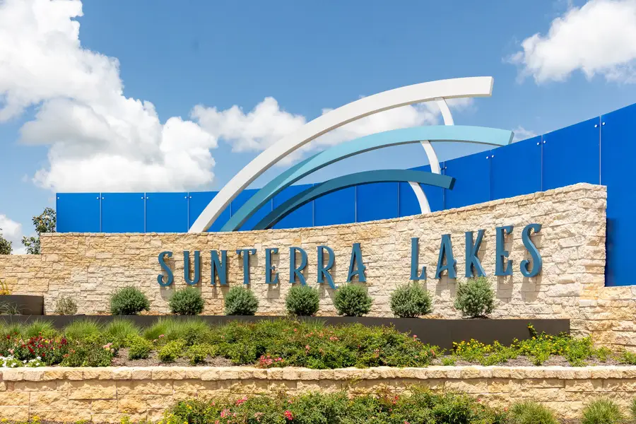 Entrance to the Sunterra Lakes community in Brookshire, TX, featuring signage and landscaping (Image 1). Entrance to the Sunterra Lakes community in Brookshire, TX, featuring signage and landscaping (Image 1).