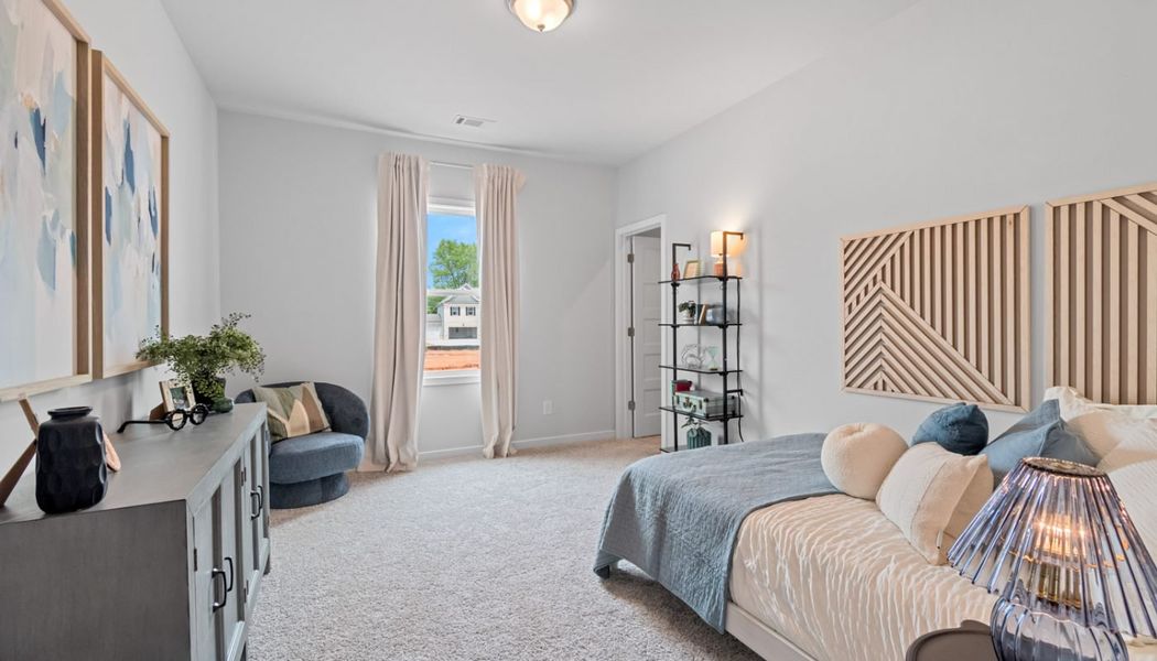 Furnished interior in a model home at Summerlin in Winder (Image 46).