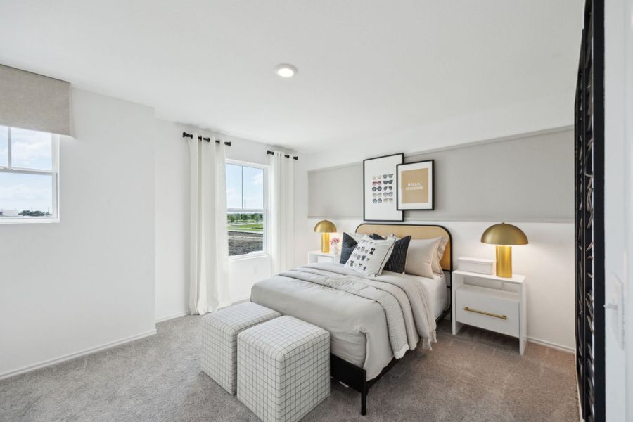 Furnished interior in a model home at Windcress in Cove (Image 14).