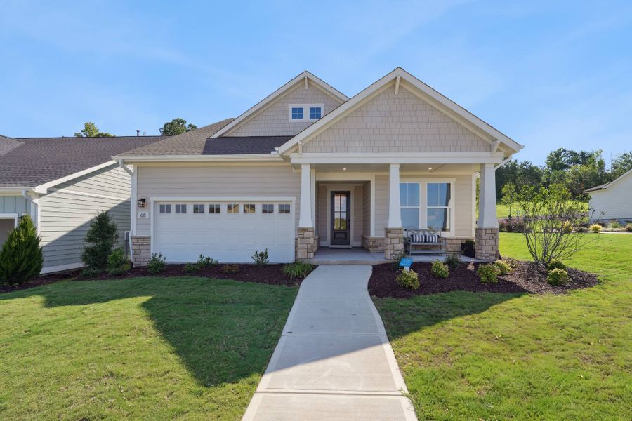 Front exterior of a home in the The Pines Collection at Serenity community, located in Fuquay Varina, NC (Image 8).