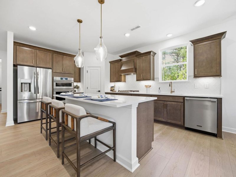Furnished interior in a model home at Sage on North Main in Wake Forest (Image 6).