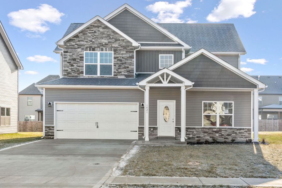 Front exterior of a home in the Cherry Fields community, located in Clarksville, TN (Image 10).