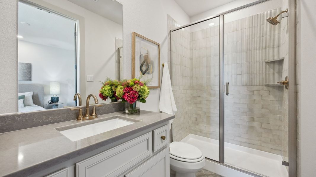 Furnished interior in a model home at Painted Tree - Woodland West in McKinney (Image 11).