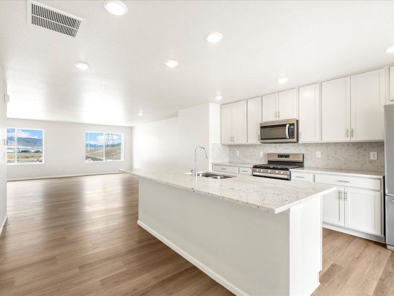 Furnished interior in a model home at Three Hills in Morrison (Image 6).