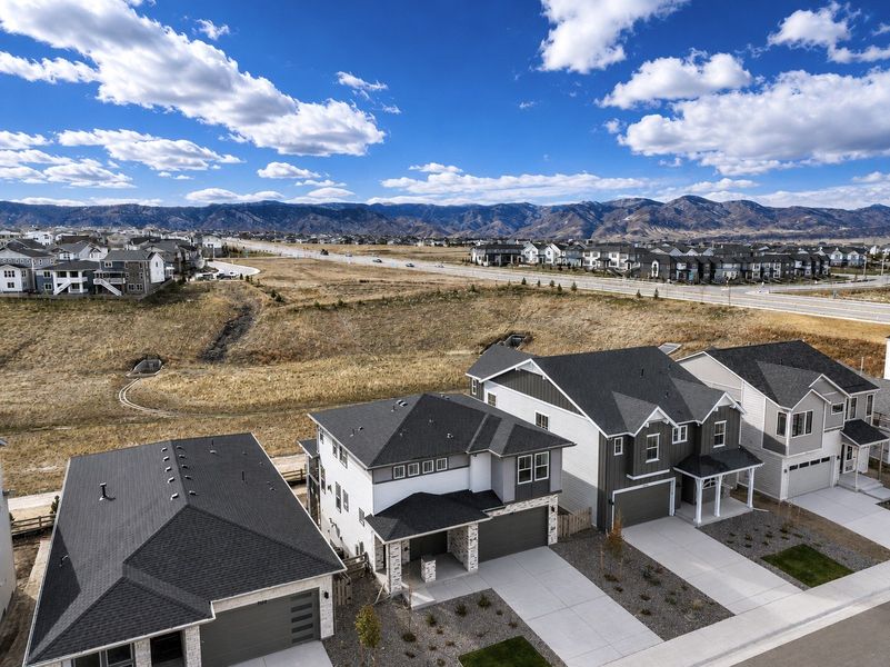 Aerial view of the Sterling Ranch Ascent Village community in Littleton, CO, showing layout and nearby surroundings (Image 1). Aerial view of the Sterling Ranch Ascent Village community in Littleton, CO, showing layout and nearby surroundings (Image 1).