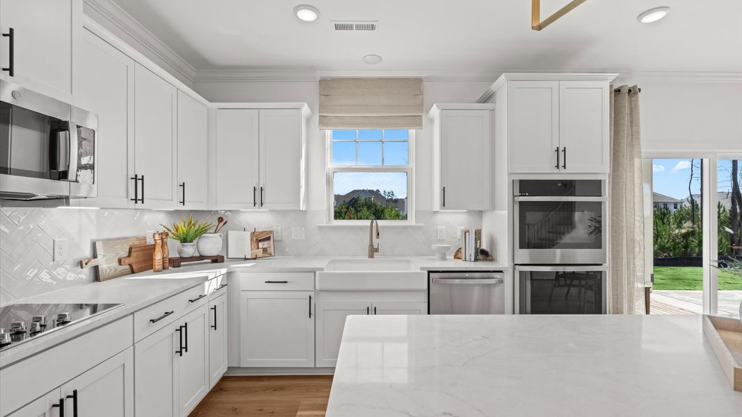 Furnished interior in a model home at Whispering Pines in Franklinton (Image 18).