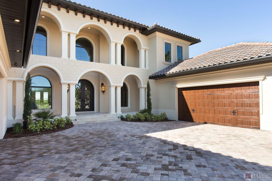 Front exterior of a home in the Laguna Village community, located in Melbourne, FL (Image 9).