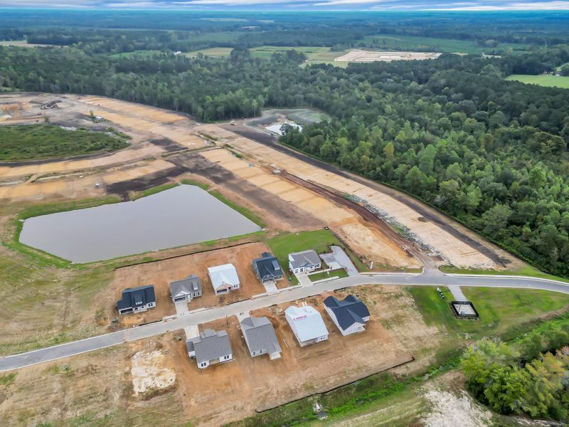 Aerial view of the Edgefield community in Loris, SC, showing layout and nearby surroundings (Image 11). Aerial view of the Edgefield community in Loris, SC, showing layout and nearby surroundings (Image 11).