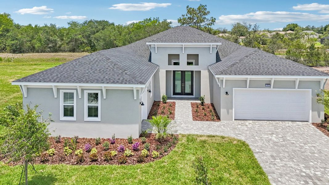 Front exterior of a home in the Serengeti community, located in Spring Hill, FL (Image 14).