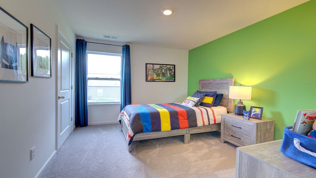 Furnished interior in a model home at Heritage Park in Fletcher (Image 33).