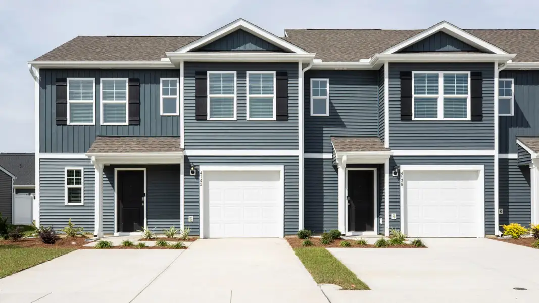 Front exterior of a home in the The Willows at Blake Farm community, located in Wilmington, NC (Image 4).