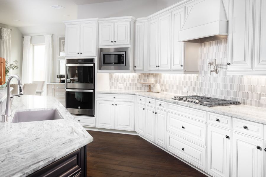 Furnished interior in a model home at Valencia: Hilltop Collection in Manvel (Image 6).