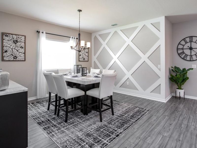 A versatile dining room can serve formal or casual meals - Summerlyn model home in Winter Haven, FL