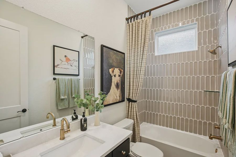 Furnished interior in a model home at Meridiana 50's in Manvel (Image 6).