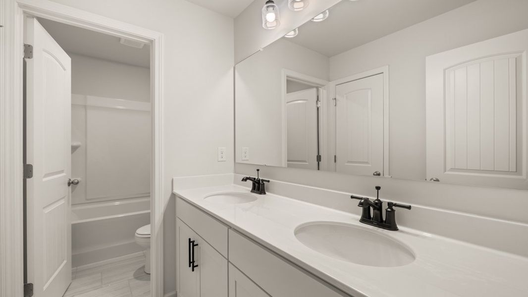 Furnished interior in a model home at Holland Estates in Powder Springs (Image 16).
