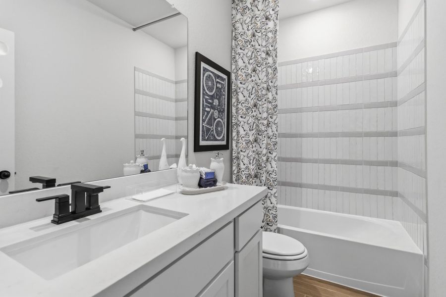 Furnished interior in a model home at Villas Las Flores in Floresville (Image 24).