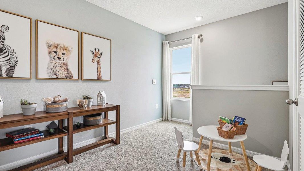 Furnished interior in a model home at Wynnstone in Davenport (Image 27).