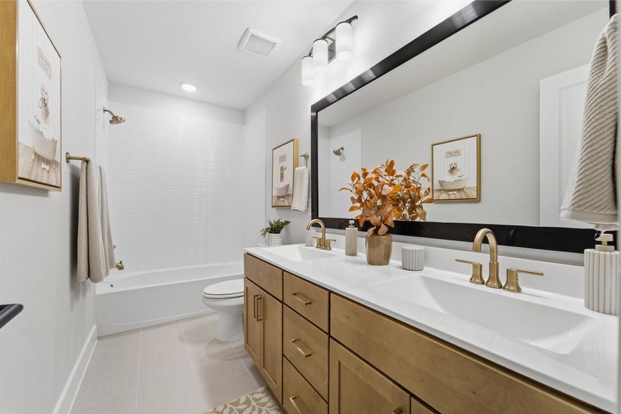 Furnished interior in a model home at Lariat in Liberty Hill (Image 48).