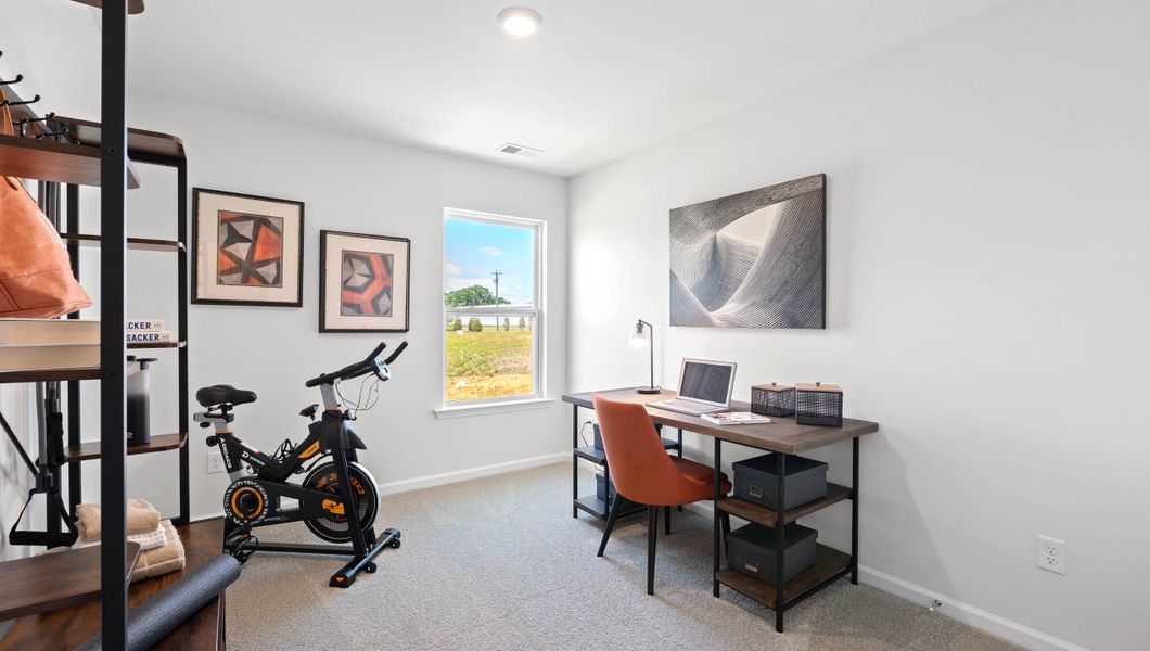 Furnished interior in a model home at Tanglewood Townes in Greenville (Image 16).