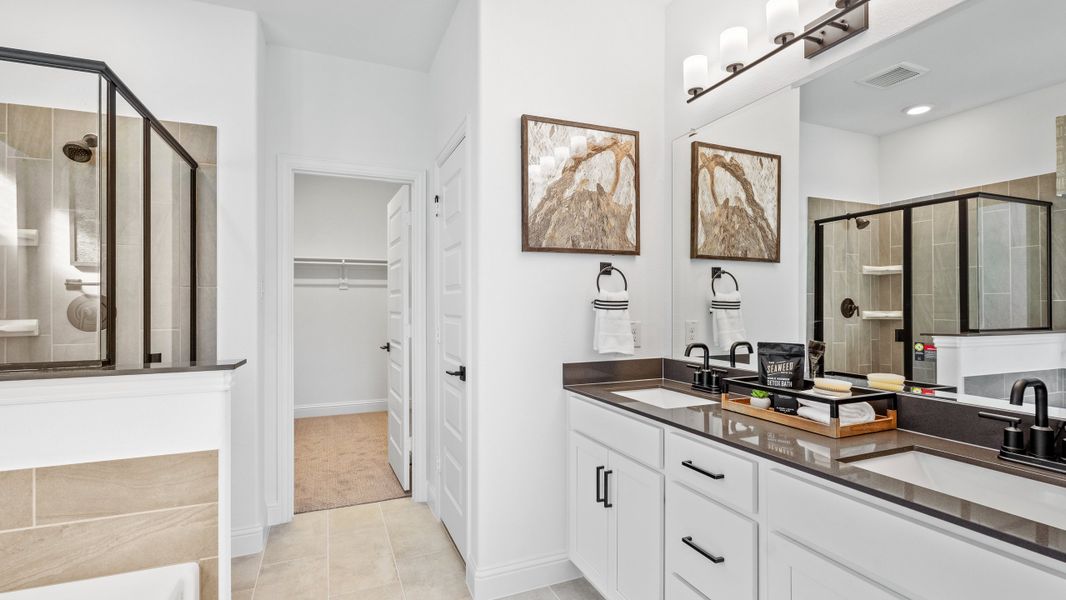 Furnished interior in a model home at Whitewing Trails in Princeton (Image 10).