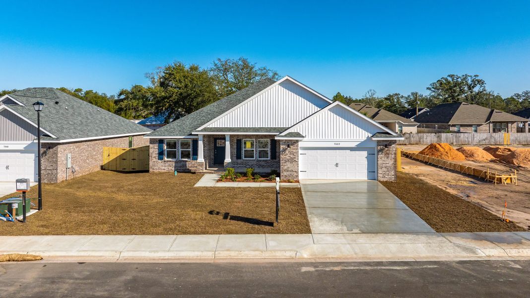 Front exterior of a home in the Buckeye's Landing community, located in Navarre, FL (Image 10).