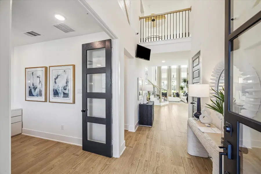 Furnished interior in a model home at Meridiana - 50' in Manvel (Image 13). Furnished interior in a model home at Meridiana - 50' in Manvel (Image 13).