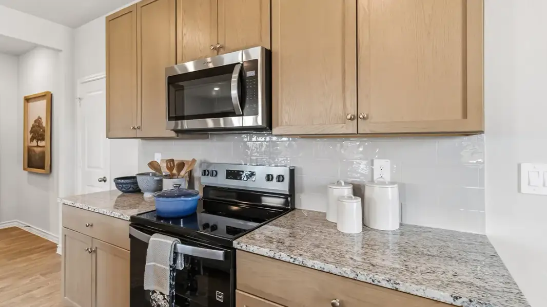 Furnished interior in a model home at Saddle Ridge Estates in Lytle (Image 18).