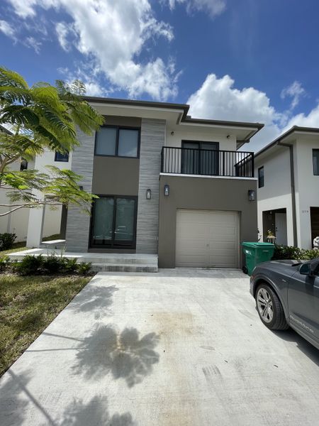 A modern two-story home with sleek design in On Alba by Onx Homes, Florida City, FL.