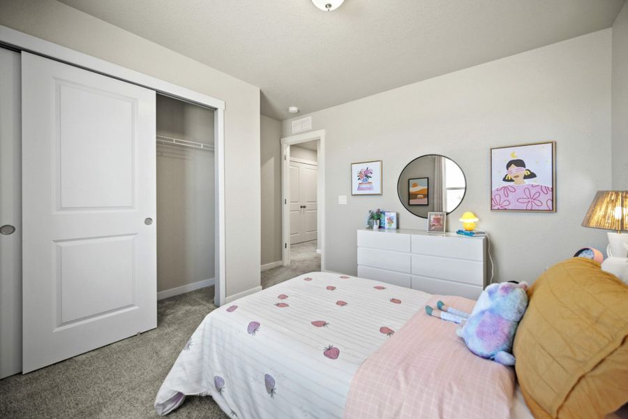 Furnished interior in a model home at Aspen Meadows – Townhomes in Colorado Springs (Image 14). Furnished interior in a model home at Aspen Meadows – Townhomes in Colorado Springs (Image 14).
