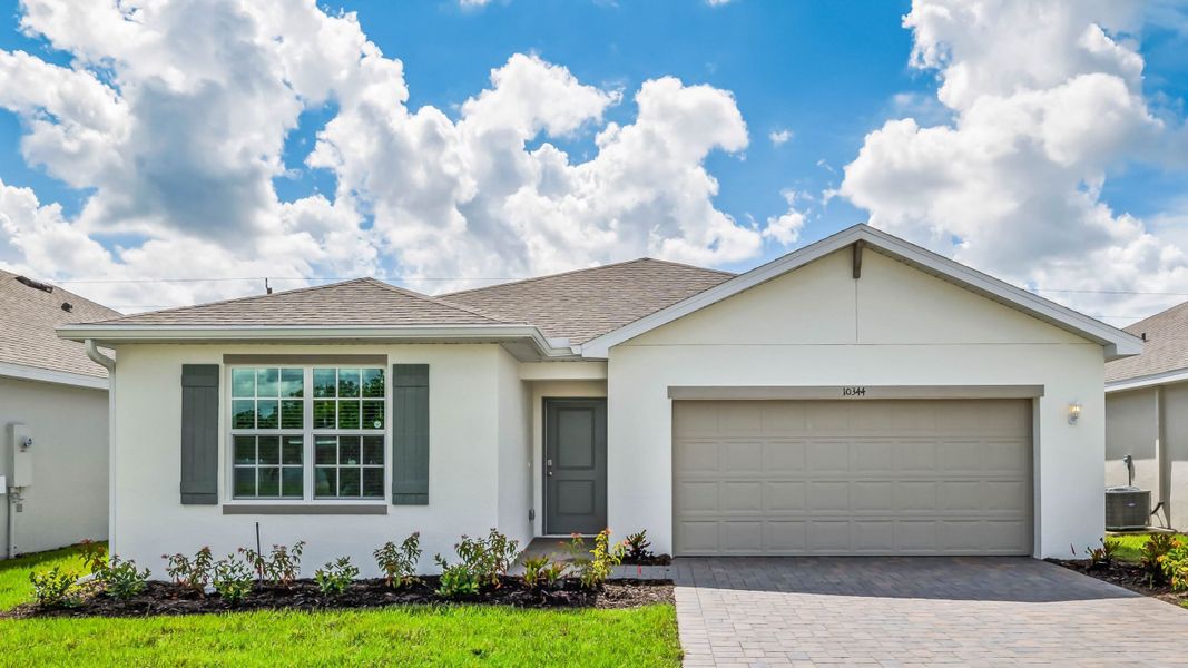 Front exterior of a home in the Cape Coral Water & Sewer community, located in Cape Coral, FL (Image 11).