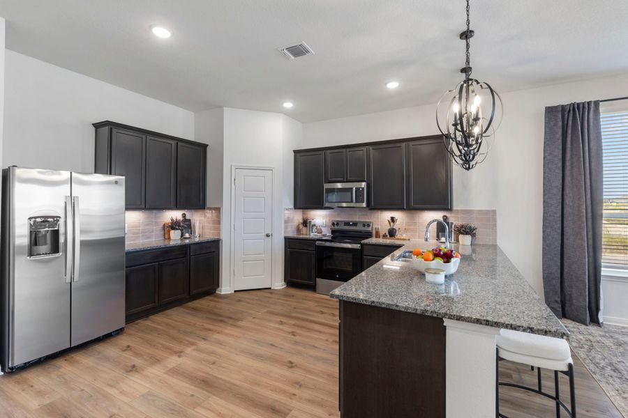 Furnished interior in a model home at Warrior's Legacy in Nolanville (Image 10). Furnished interior in a model home at Warrior's Legacy in Nolanville (Image 10).